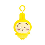 Yellow Chiikawa pyjama plush keychain with smiling face and top hanging loop