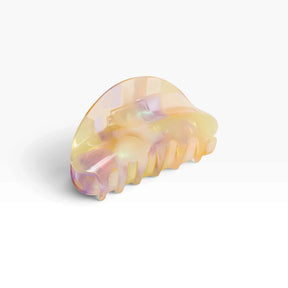 Pastel translucent acrylic claw clip with curved teeth, iridescent finish