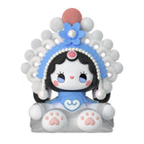 This delightful figurine from the Lucky EMMA - Secret Forest of Dim Lights Series Blind Box collection showcases an enchanting large headdress and a blue and white outfit. The charming piece, in a sitting pose with pink paw-like feet, also balances a peach on its head. Every purchase offers an element of surprise as part of the series from Lucky Emma.