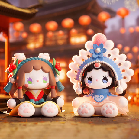 The Lucky EMMA - Secret Forest of Dim Lights Series Blind Box by Lucky Emma features two charming, round figurines dressed in theatrical costumes with vibrant headpieces, beautifully set against a scene of traditional architecture and festive lights, embodying the magical allure of a Secret Forest.