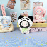 Fuzzy plush keychain with panda face and green shirt, sitting pose, gold key ring