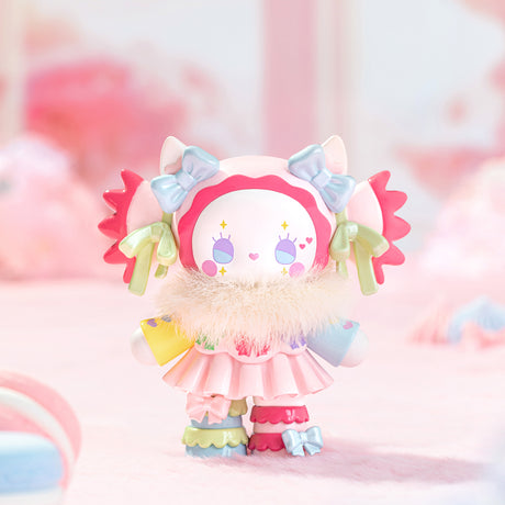 Pastel-colored Emma Secret Forest Love Dopamine figure with bows, fluffy collar, and heart-shaped face details on soft pink background