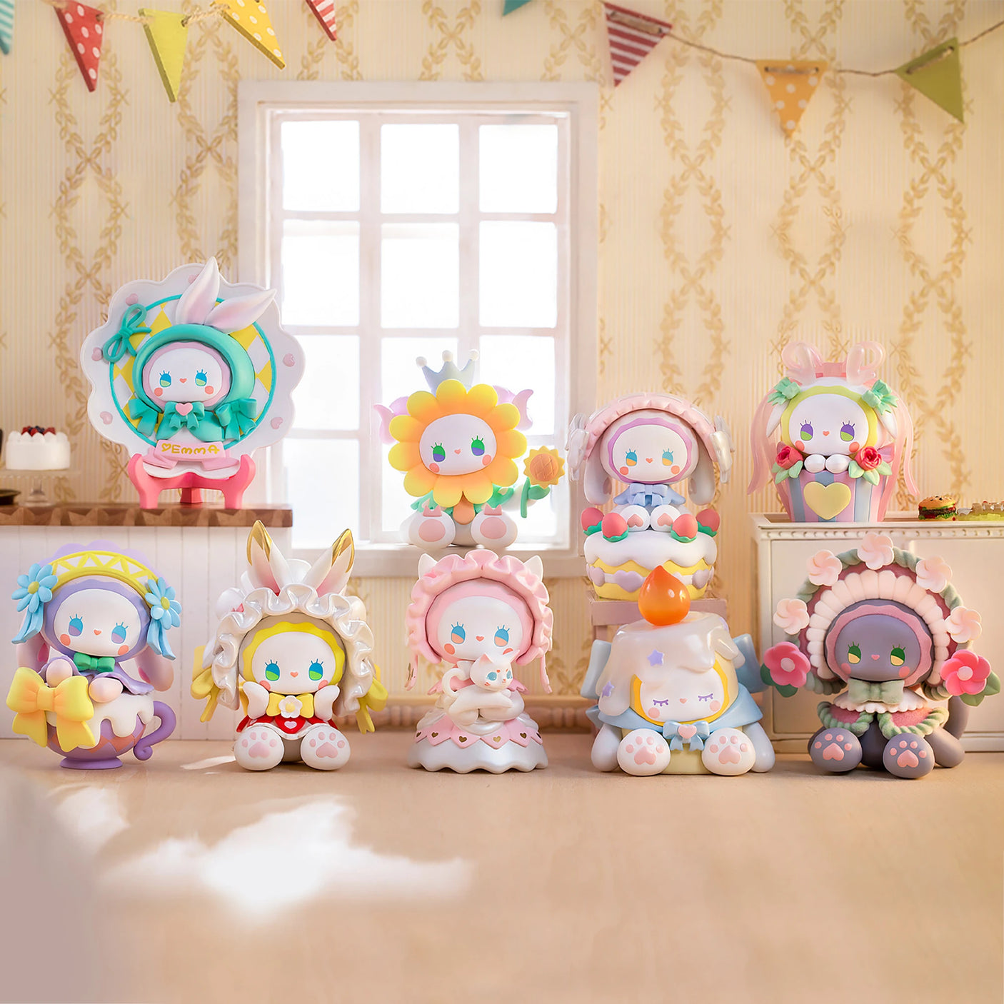 A set of vibrant, hand-painted, animal-themed figurines from the Lucky EMMA - Secret Forest Birthday Party Blind Box collection by Lucky Emma is displayed in two rows near a window, adorned with pastel-colored decorations.