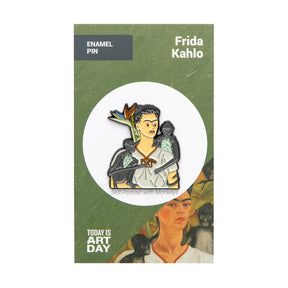 Enamel pin featuring a Frida-style woman with monkeys