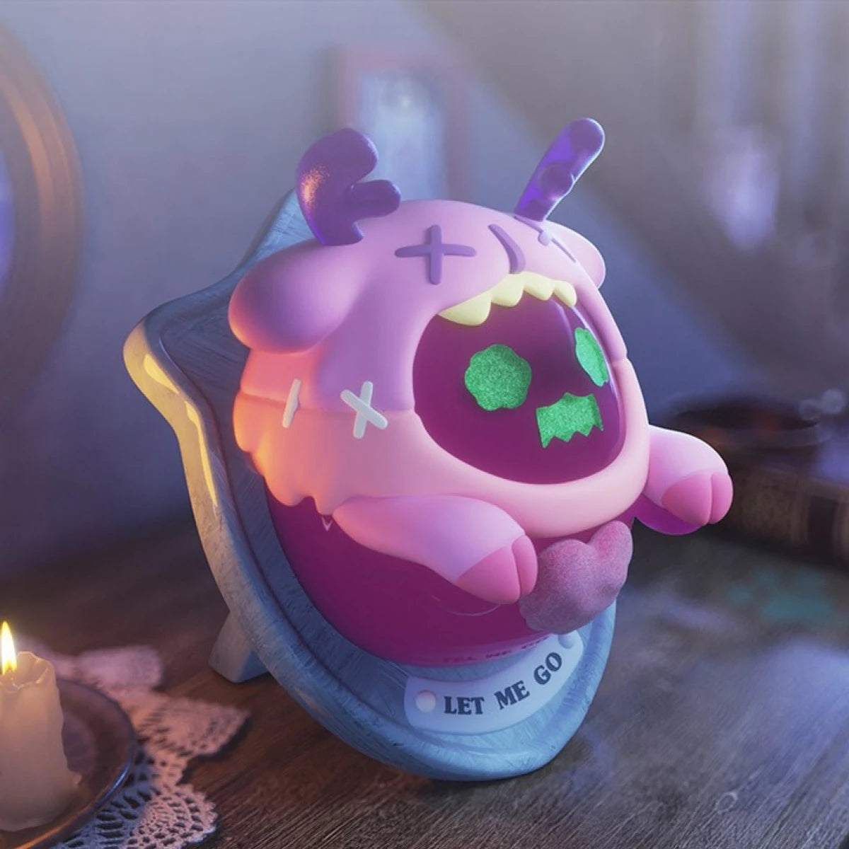 Purple ghost bear blind box figure sitting on a donut-shaped accessory