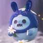 Blue and lavender ShinWoo Secret Bear figure holding white daisy with surprised expression on soft purple background