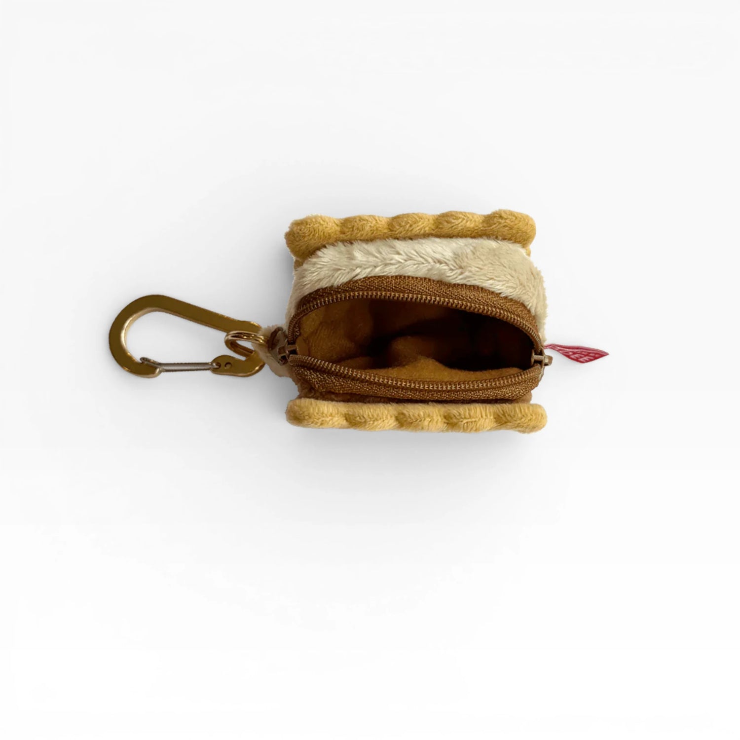 Plush cookie-shaped AirPods case with open zipper and metal carabiner clip