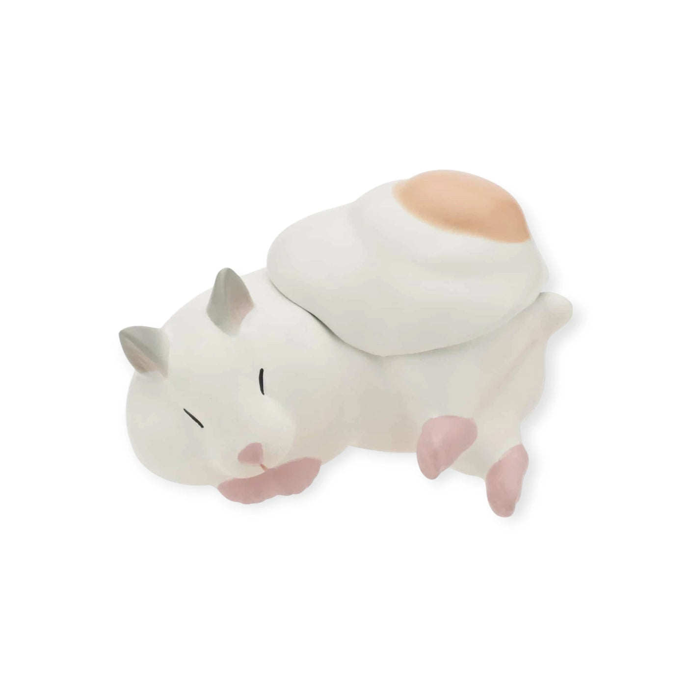 The Kitan Club's Hamster ‘N Egg Blind Box features a small, stylized white cat with closed eyes, a pink-tinted ear and cheek, and a charming brown spot on its back, making it a whimsical addition to any mini figure display.