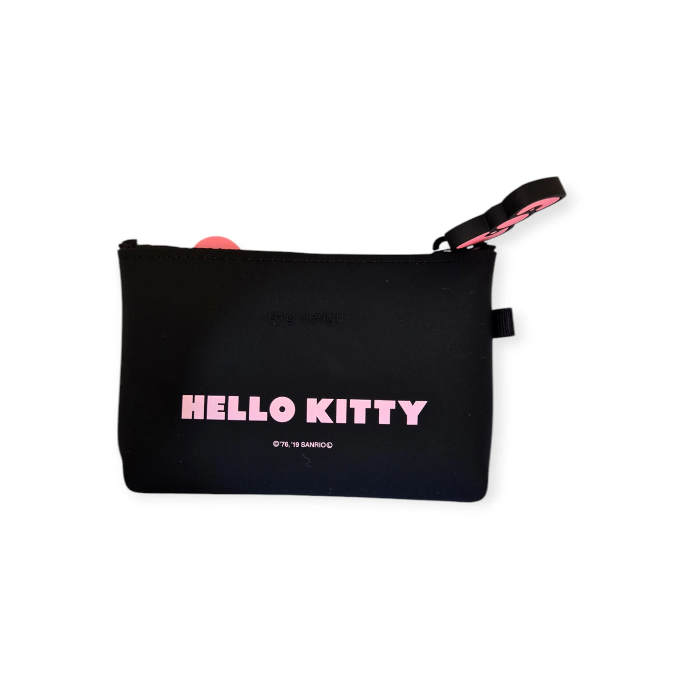 The Hello Kitty Zip Case - Black boasts a soft silicone finish, pink text, and a side strap for compact convenience.