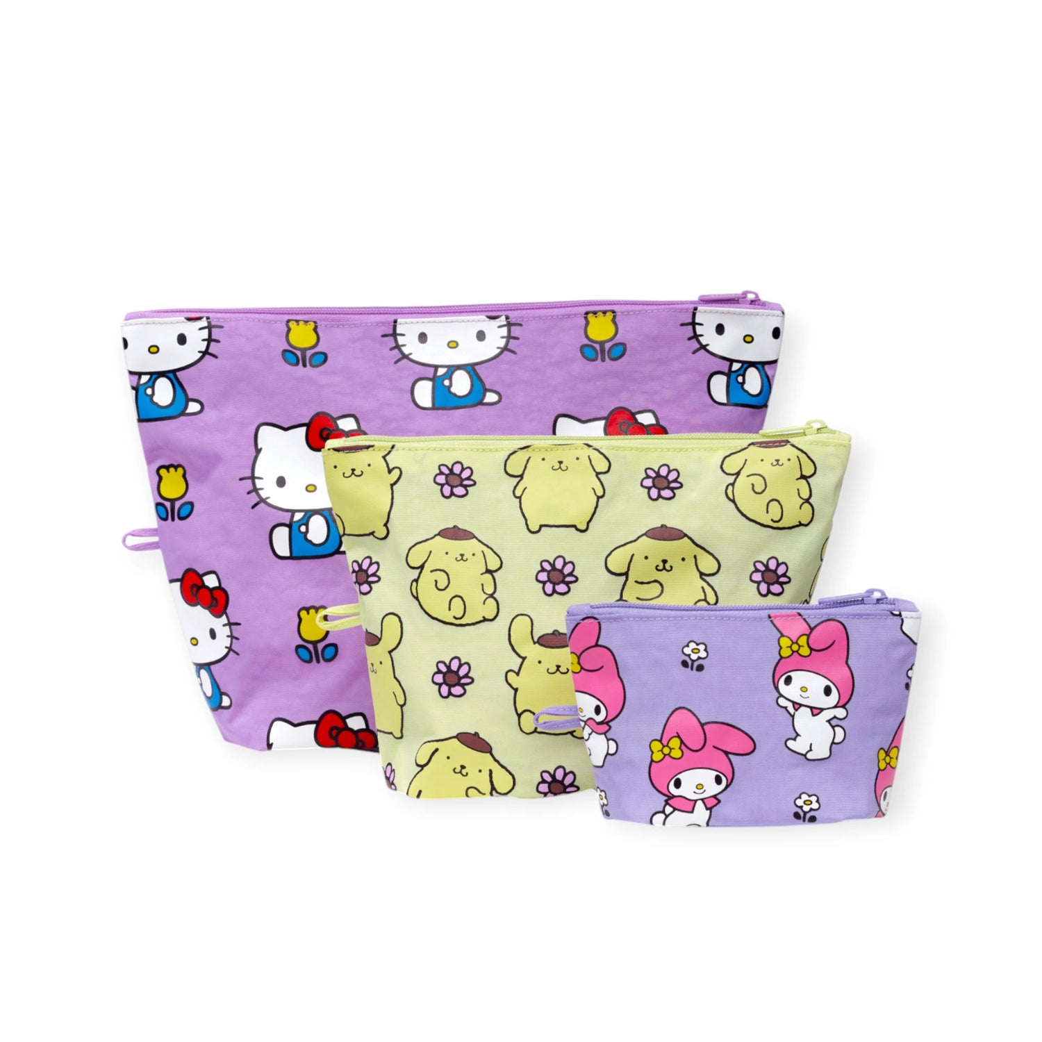The Baggu Hello Kitty x Baggu Go Pouch Set includes four pastel purple and yellow zipper pouches featuring Hello Kitty, Pompompurin, and My Melody—perfect for fans of stylish and functional organizers.