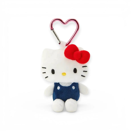 Heart clasp keychain with Hello Kitty plush, blue overalls and red bow
