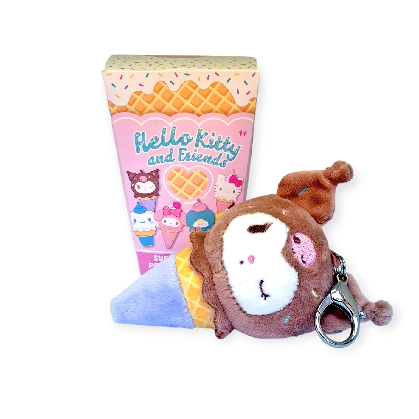 A delightful Hello Kitty & Friends Keychain - Ice Cream Blind Box sits alongside a colorful box adorned with charming illustrations of Hello Kitty characters.