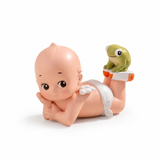 Kewpie blind box figure crawling while holding a green turtle on an orange base
