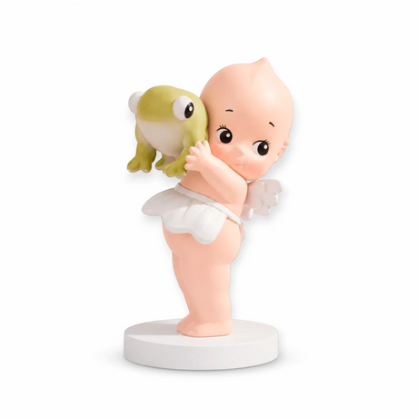 Kewpie holding things blind box figurine holding a small yellow fish