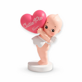 Kewpie holding things blind box figurine holding a red heart-shaped candy