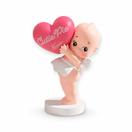 Kewpie holding things blind box figurine holding a red heart-shaped candy