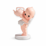 Kewpie holding things blind box figurine holding a small pink teapot