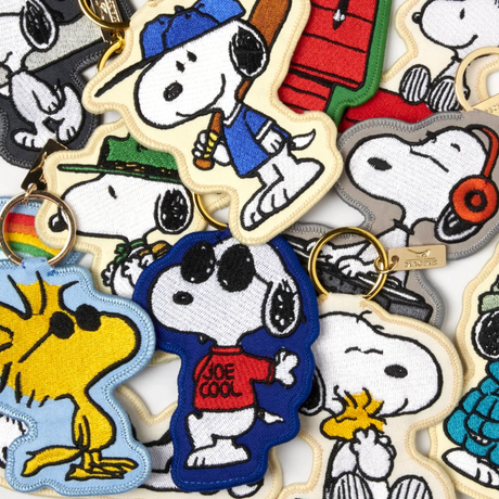 Embroidered Snoopy camp scout key charms with multiple key rings and patches