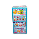 Introducing the Re-Ment Kirby's Pupupu Market Blind Box, a captivating collection of minis with colorful packaging adorned with Japanese text and delightful images of miniature breakfast items and desserts. Embrace the excitement of blind boxes as you reveal each charming piece, ideal for collectors.