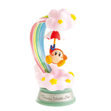 In a scene filled with clouds and stars, a mysterious Parasol Waddle Dee swings from a red umbrella against a rainbow backdrop. This charming figure is part of the Re-Ment Kirby Swing Blind Box collection, showcasing the whimsical charm of beloved Kirby characters.