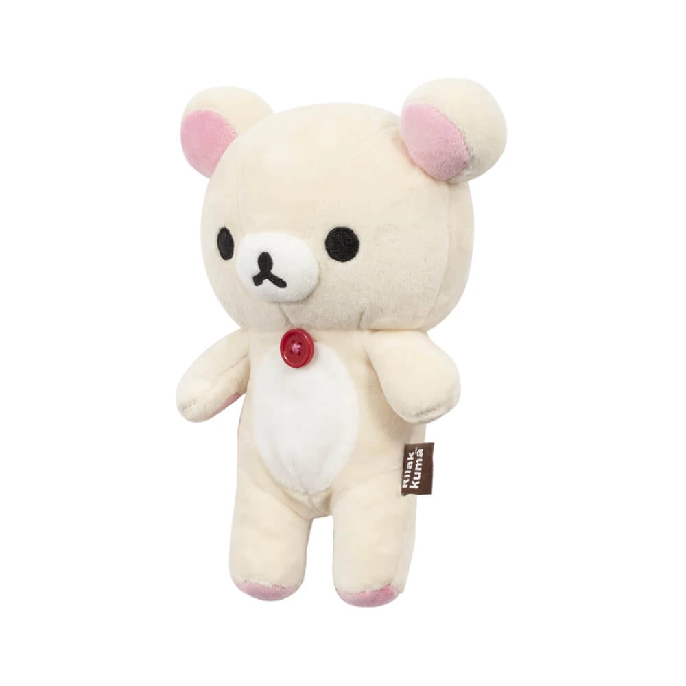 The Rilakkuma Korilakkuma Small Plush - 20cm features beige fur, pink ears, a white belly, red chest button, and brown side tag—crafted for premium softness and showcasing Korilakkuma’s playful charm.