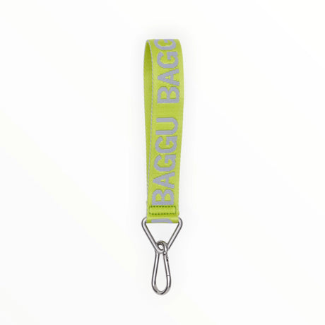 The Baggu Logo Keychain - Citron, crafted from recycled nylon in green, features a chic design with the distinctive Baggu logo and a sturdy metal clip at the bottom.