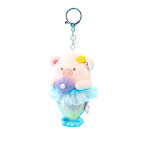 LuLu The Piggy plush keychain dressed as a mermaid with sequinned tail and seashell accessory, promo image gallery 1