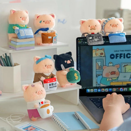 Office-themed plush piggy keychains, assorted outfits and accessories on display.