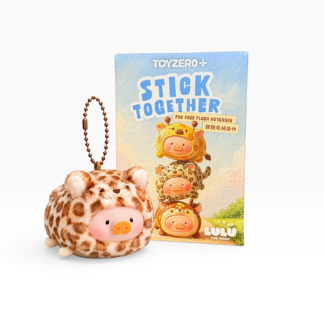 Lulu the Piggy PVC keychain with beaded ball chain, shown in retail package