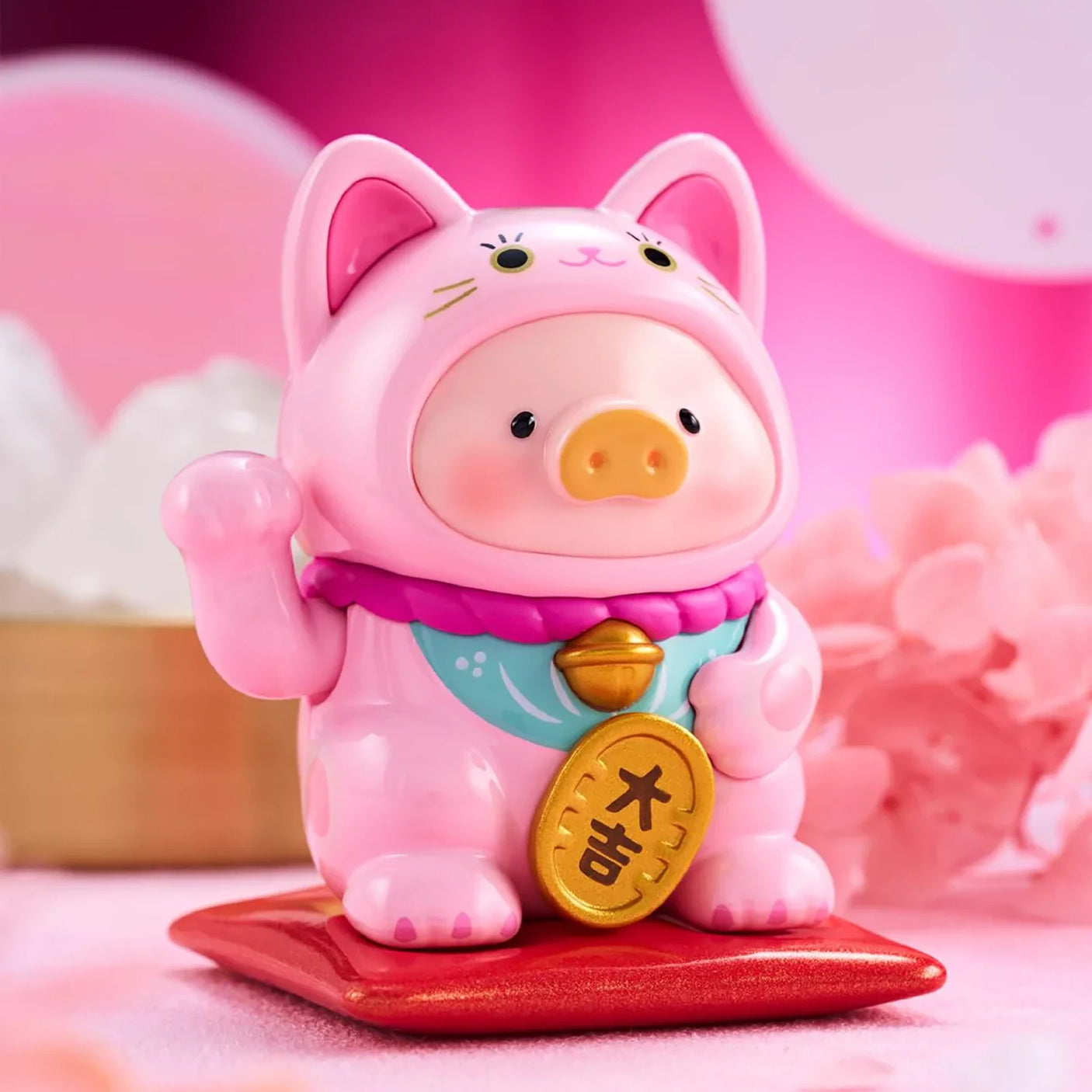 LuLu The Piggy - Lucky Cat Blind Box featuring a pink piggy figurine in a cat costume with gold bell on red cushion by LuLu The Piggy