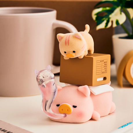 Piggy blind box figure curled with a clipboard box and clear desk accessory
