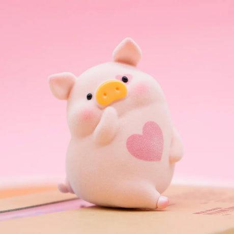 LuLu the Piggy Original Series 2 figure 9 with raised hoof and pink heart on soft textured body on pink background