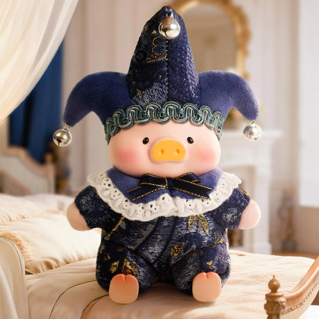 Plush pig doll wearing dark blue jester outfit with lace collar and silver bells seated on ornate bed in cozy room
