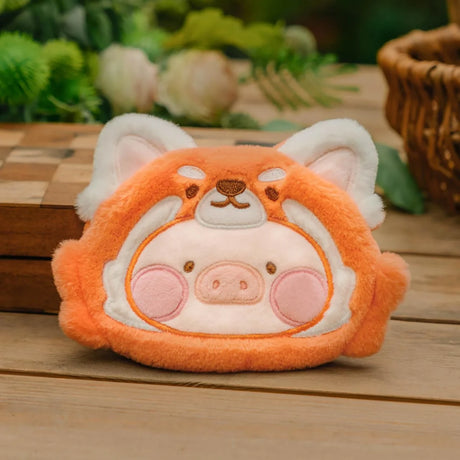 Front view of LuLu The Piggy Animal Party Pouch in red panda design resting on wooden surface, gallery 1
