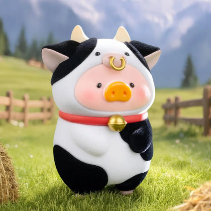 Pig blind box figurine in black-and-white cow costume with red collar bell
