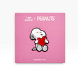 Snoopy love heart enamel pin on PEANUTS card, white dog holding a red heart