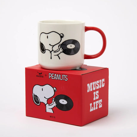 Snoopy ceramic mug with red handle, featuring Snoopy and a vinyl record graphic
