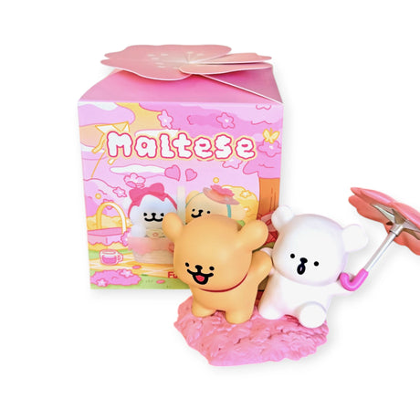 Maltese Blind Box - Cherry Blossoms by Funism showing two playful dog figures on pink blossom base with matching box design