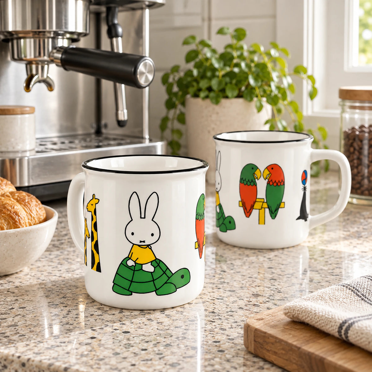 Two white ceramic animal-print mugs with rabbit and parrot designs, side handles