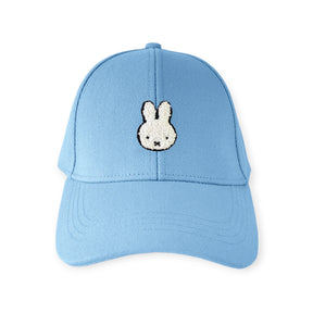 Light blue kids baseball cap with embroidered white bunny face at front