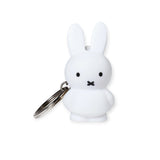 The Miffy Bunny Keychain - White, designed by Miffy, stands upright against a plain background, highlighting its minimalist style with its iconic bunny shape.