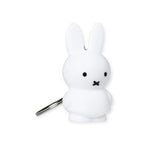 The Miffy Bunny Keychain - White, by the brand Miffy, showcases a minimalist style with its white bunny shape, small black eyes, and "X" for a mouth. This iconic design embodies simplicity and charm in one delightful accessory.