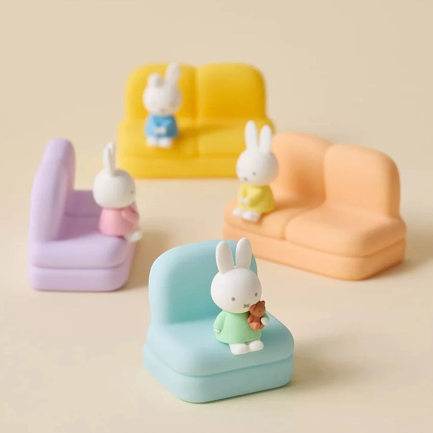 Set of phone stand sofas with three pastel rabbit figures