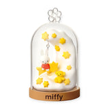 Miffy terrarium dome with rabbits and yellow star confetti decoration