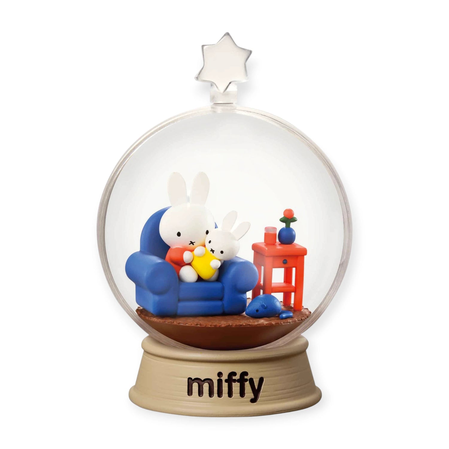 Miffy terrarium dome with blue couch scene, two rabbits and an orange-red table