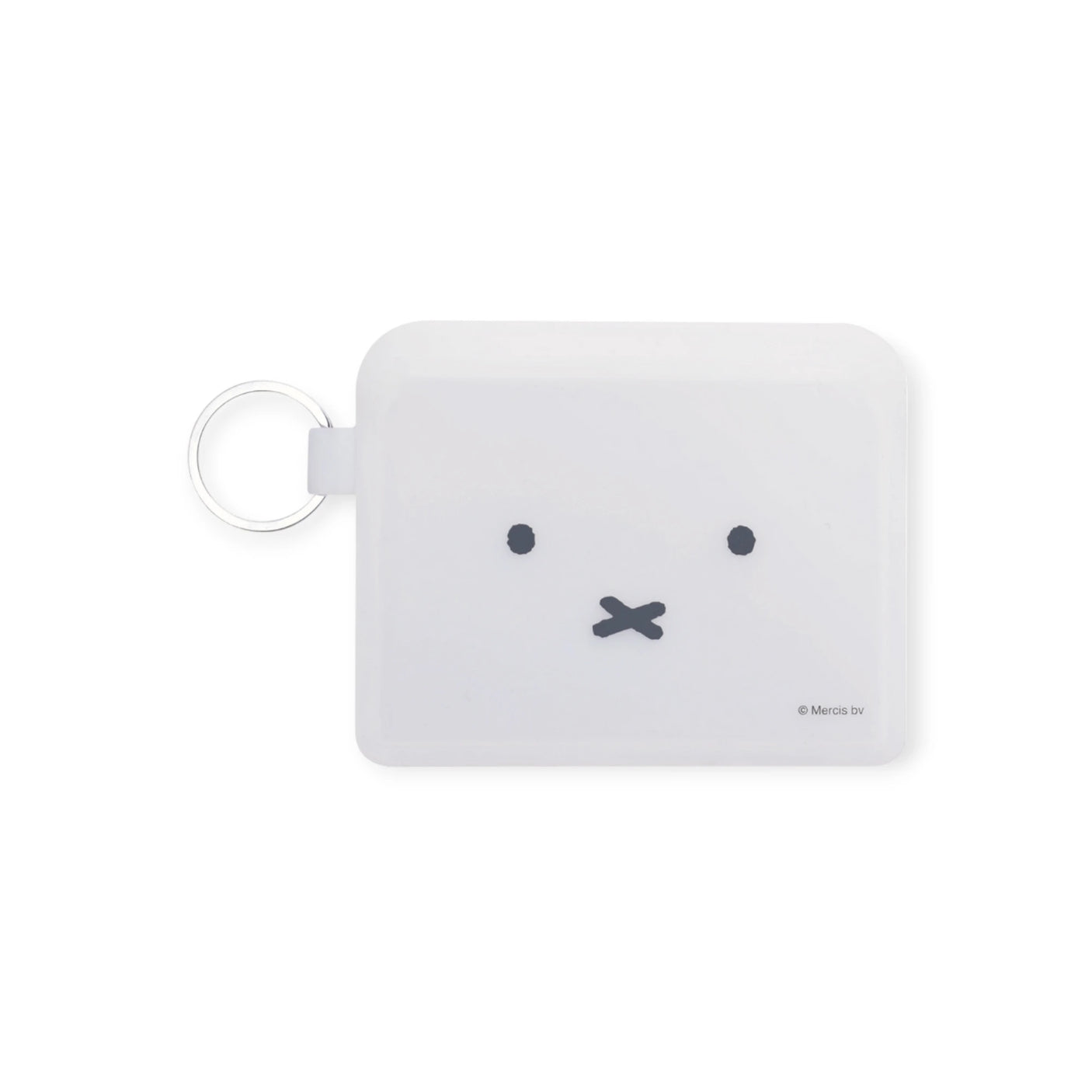 The white rectangular keychain boasts a simple face design with two dots for eyes and a small "x" for a mouth, complemented by a semi-transparent case. This makes it an ideal accessory for enthusiasts of the Miffy Bunny Card Case - White by Miffy.