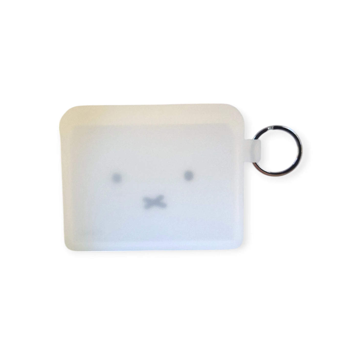 Semi-transparent silicone Miffy Bunny card case in white, showcasing a minimalist face with dotted eyes and an "x" for the mouth.