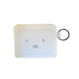 Semi-transparent silicone Miffy Bunny card case in white, showcasing a minimalist face with dotted eyes and an "x" for the mouth.