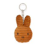 This eco-friendly Miffy Plush Flat Keychain, by the beloved brand Miffy, showcases a brown, corduroy-textured rabbit head complete with a metal ring and chain.