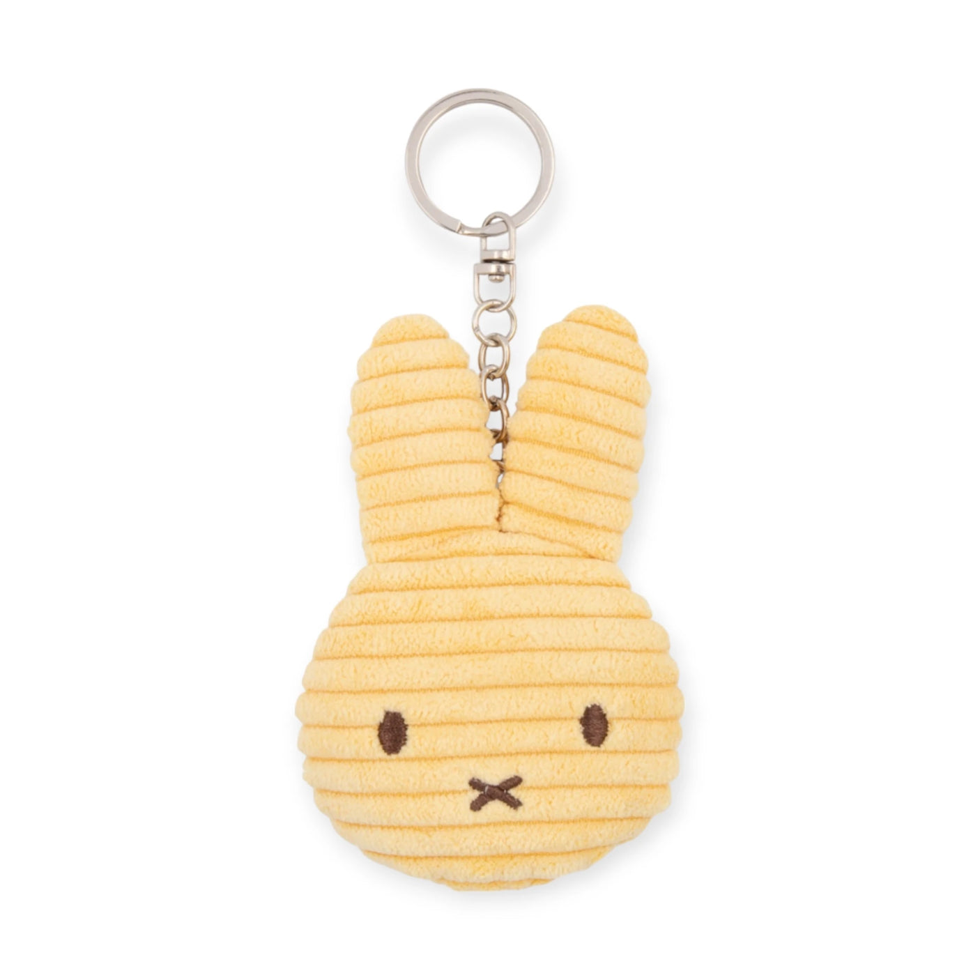 The Miffy Plush Flat Keychain - Corduroy features a yellow bunny head design made from corduroy, with long ears and simple facial details, attached to a metal keyring.